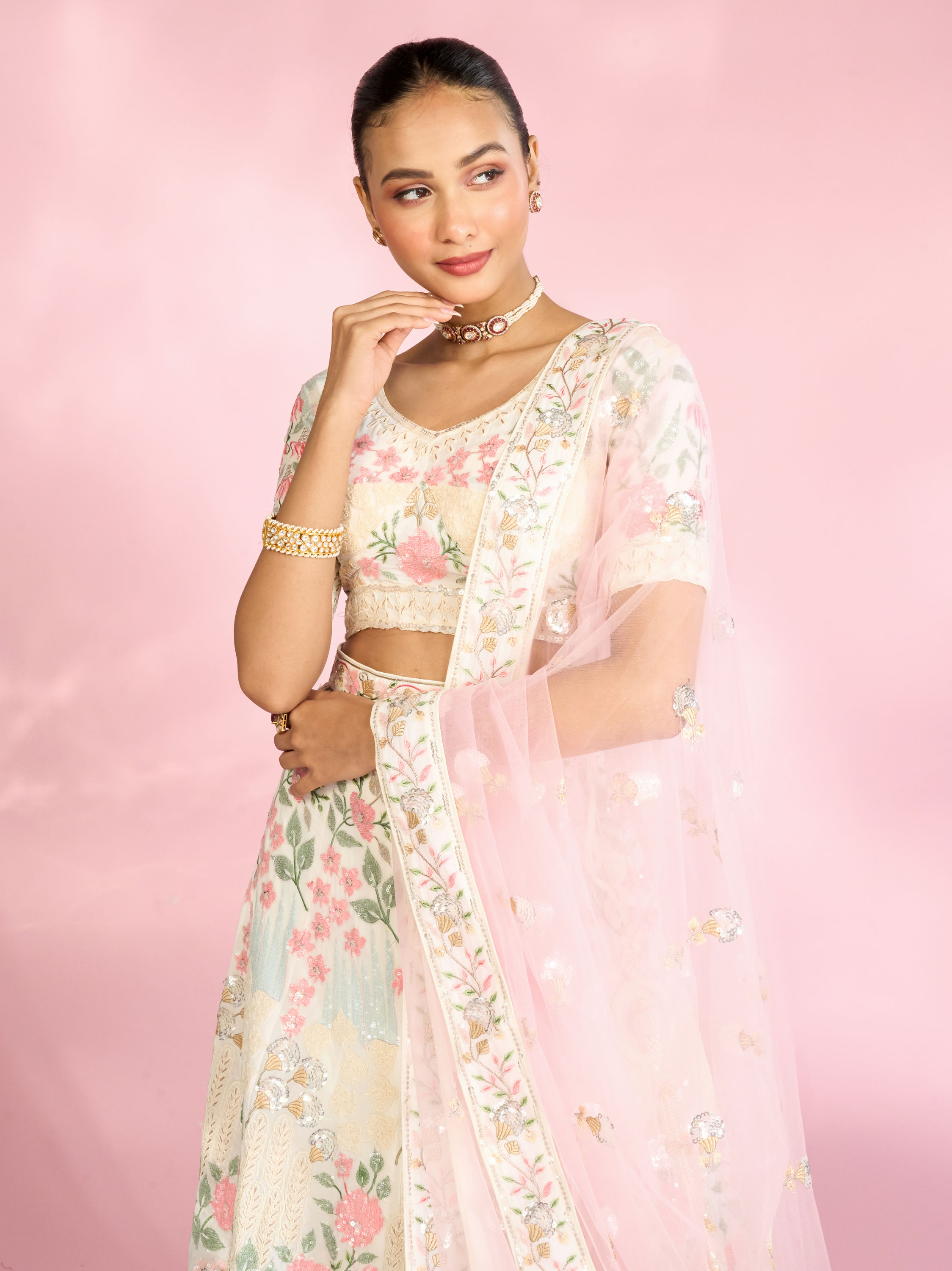 Mohey Women Cream Floral Sitara Embroidered Lehenga with Round Trimmed Latkans