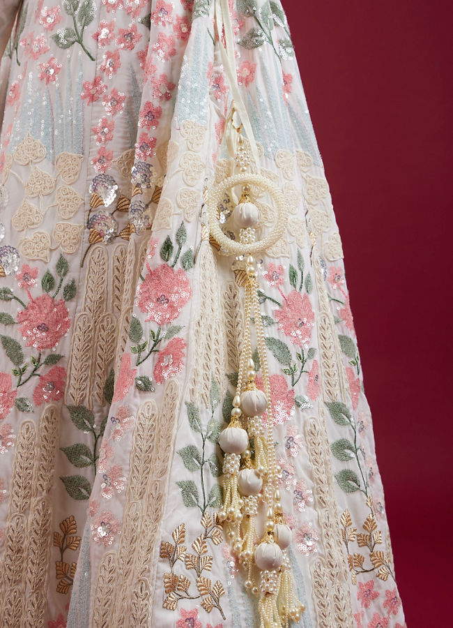 Mohey Women Cream Floral Sitara Embroidered Lehenga with Round Trimmed Latkans