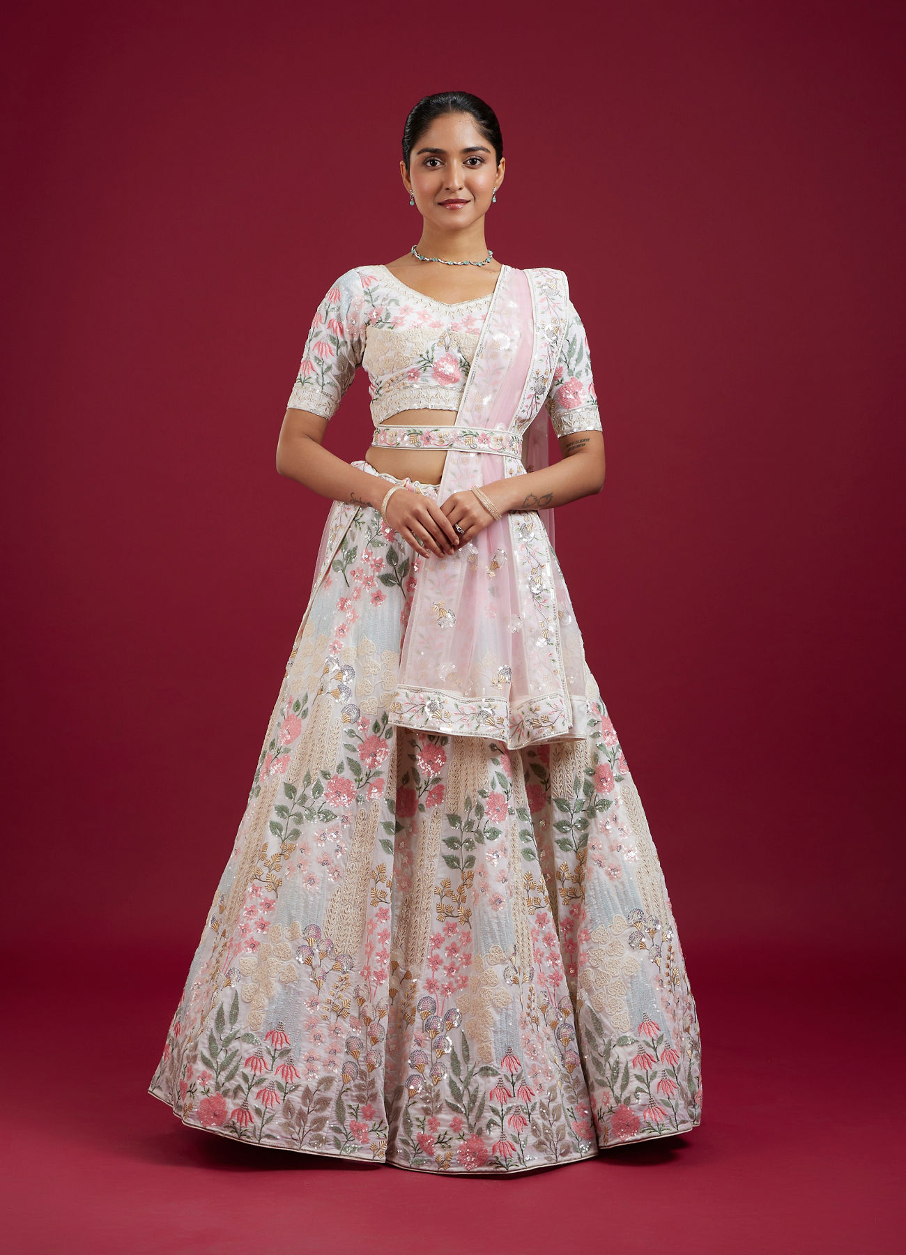 Mohey Women Cream Floral Sitara Embroidered Lehenga with Round Trimmed Latkans