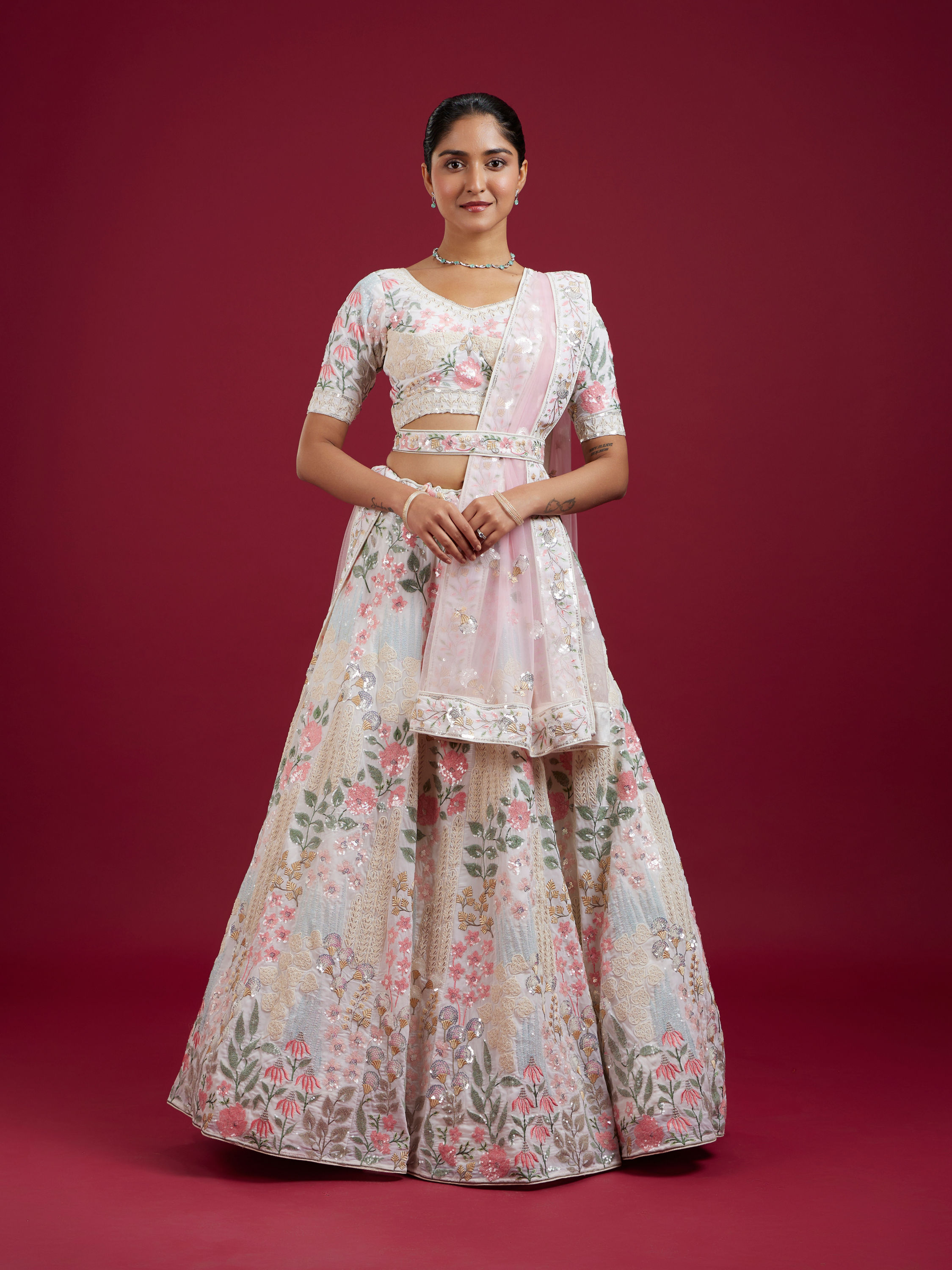 Mohey Women Cream Floral Sitara Embroidered Lehenga with Round Trimmed Latkans