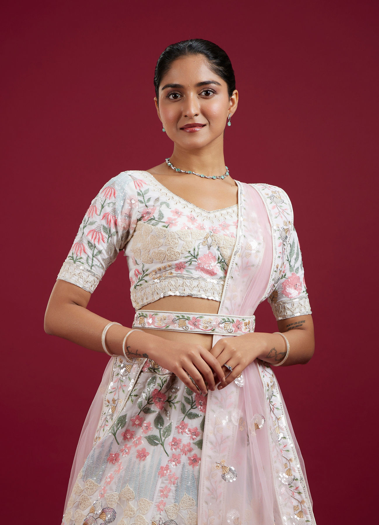 Mohey Women Cream Floral Sitara Embroidered Lehenga with Round Trimmed Latkans