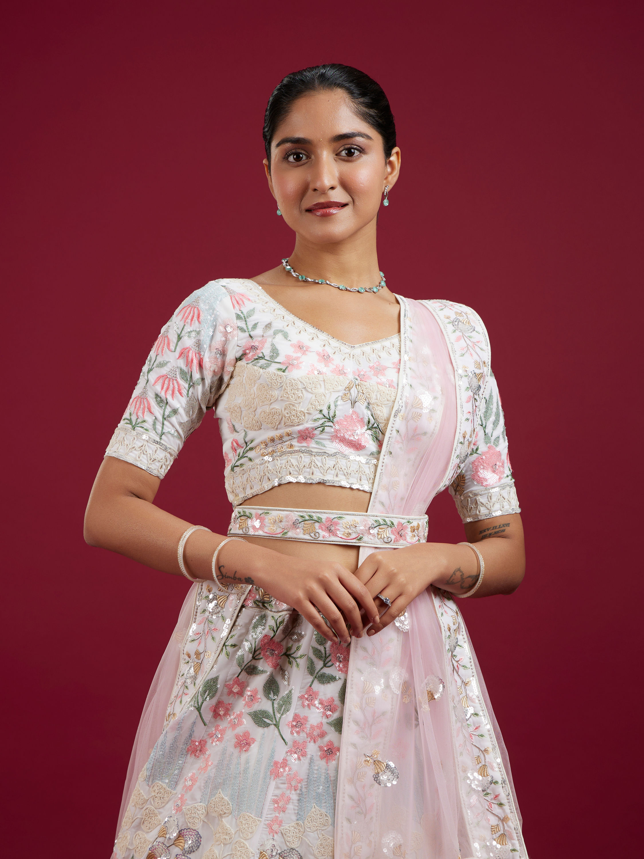 Mohey Women Cream Floral Sitara Embroidered Lehenga with Round Trimmed Latkans