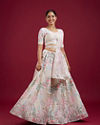 Mohey Women Cream Floral Sitara Embroidered Lehenga with Round Trimmed Latkans