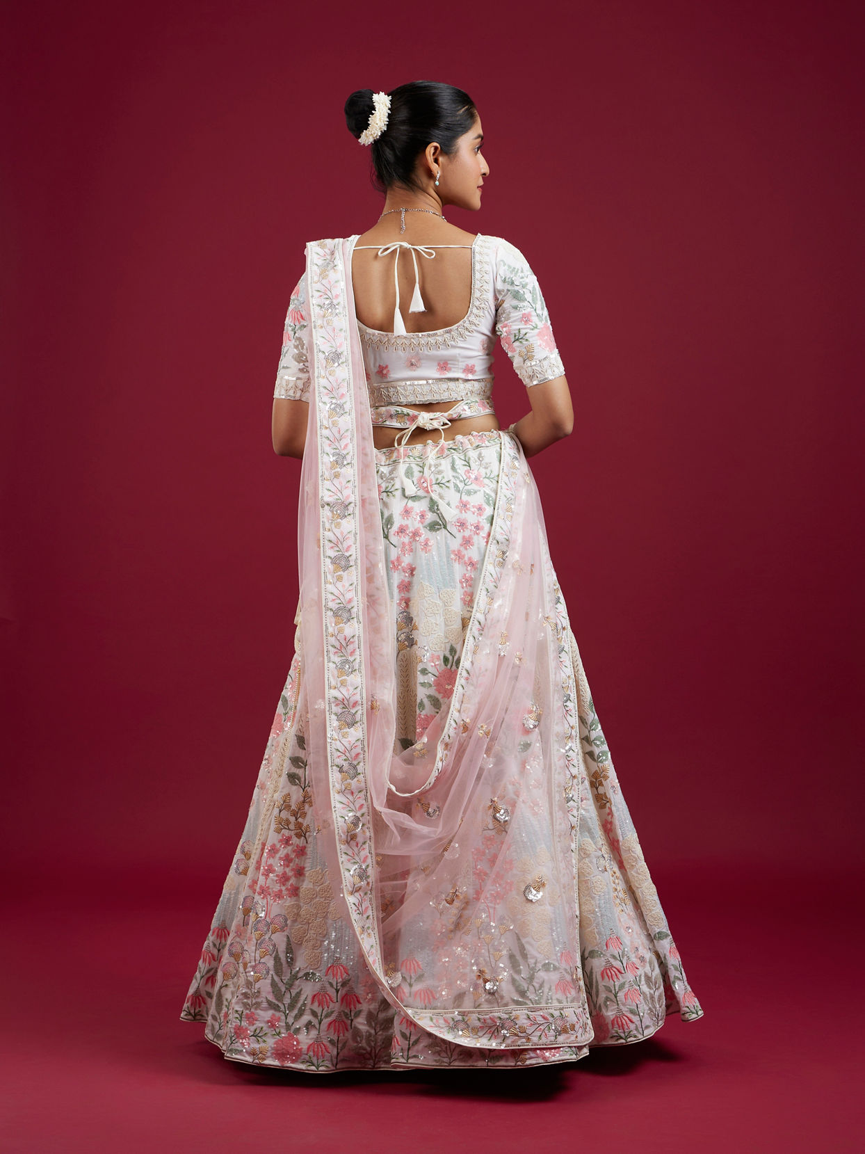 Mohey Women Cream Floral Sitara Embroidered Lehenga with Round Trimmed Latkans