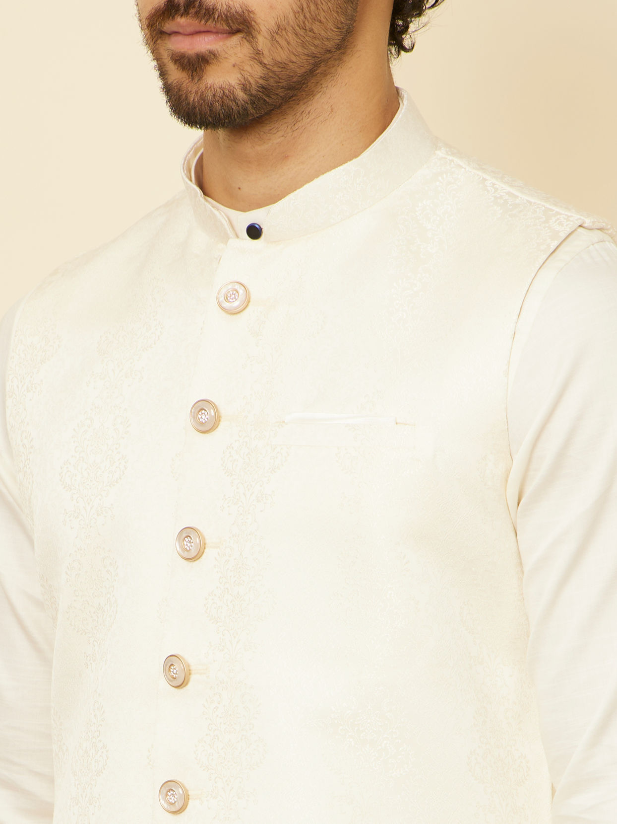 alt message - Manyavar Men Warm White Imperial Jaal Patterned Jacket image number 1