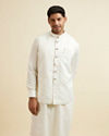 alt message - Manyavar Men Warm White Ditsy Floral Print Jacket image number 0