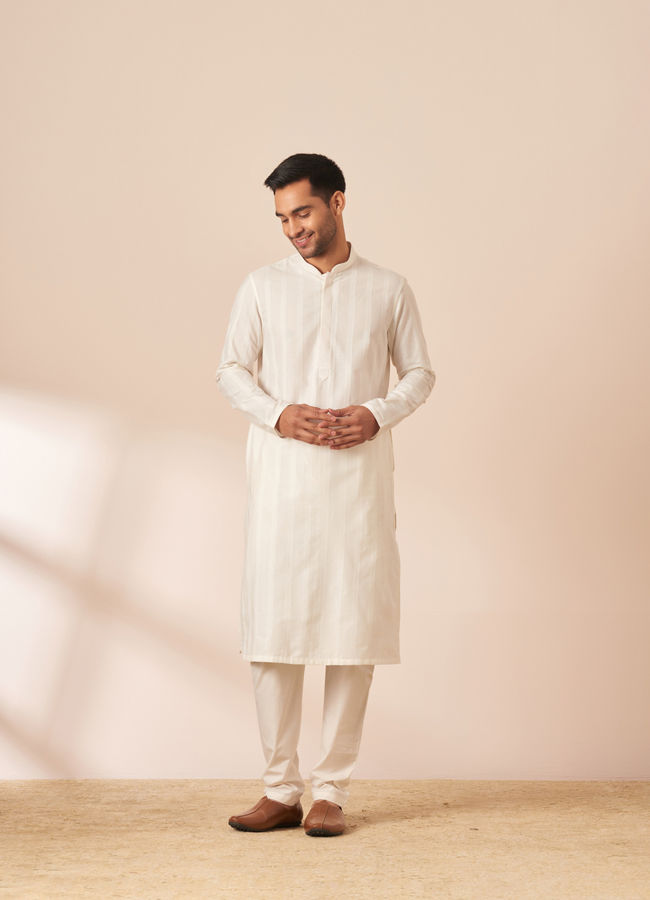 alt message - Manyavar Men Pearl White Self Striped Kurta Pajama image number 1